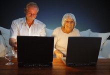 2063-senior_couple_on_computers_feature