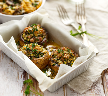 Stuffed mushrooms in a casserole dish