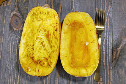 Overhead view of Spaghetti squash on a wooden background