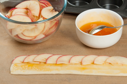 Cooking Process Of Apple Roses. Sliced And Whole Apples. Apricot Glaze