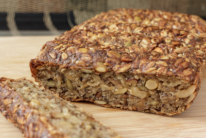 seed and nut loaf on cutting board