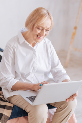 Smiling female working at home