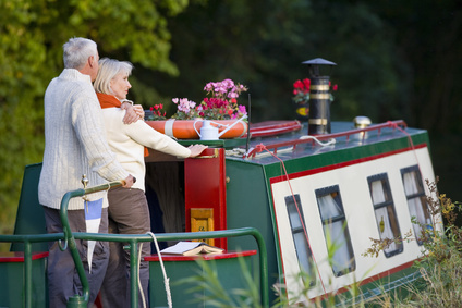 Couple hugging on narrow boat