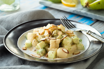 Cucumber avocado pear salad with tahini dressing