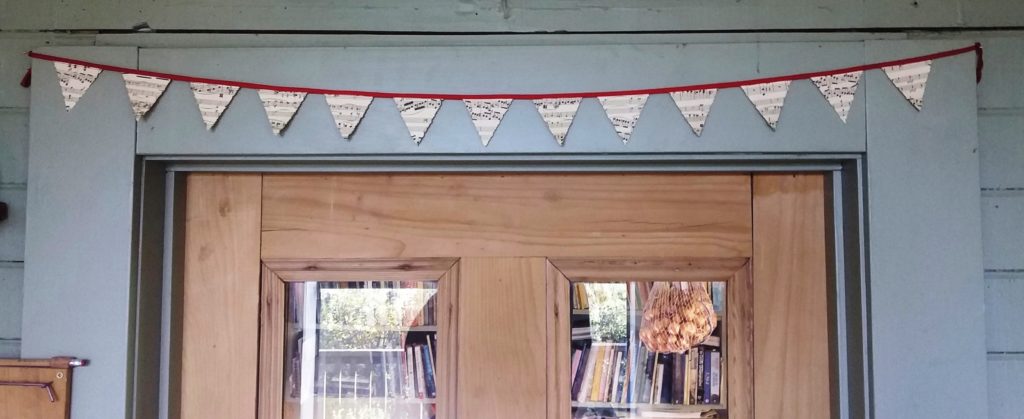 Hang your mini bunting on the door frame.