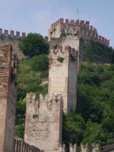 Soave walls of the castle above the vineyards