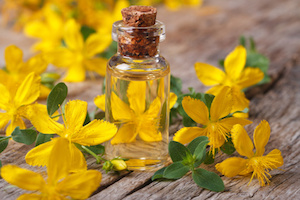 remedy St. John's wort flower in a glass bottle
