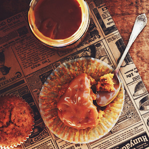 Homemade carrot muffins with caramel sauce for breakfast, top view