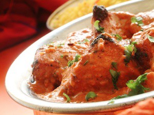 chicken tikka massala in metal dish