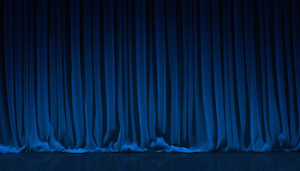Blue curtain on theater or cinema stage.