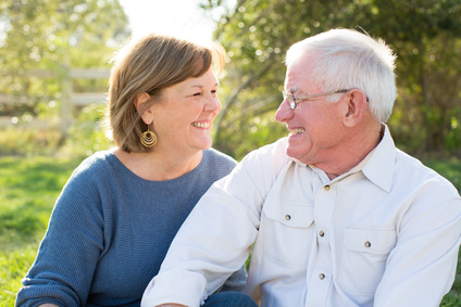 Happy senior mature couple in love outside in nature