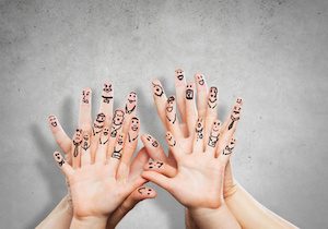 Close view of child and parent hands as symbol of happy family