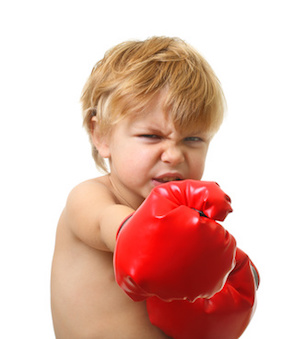 Young boy boxing isolated on white background