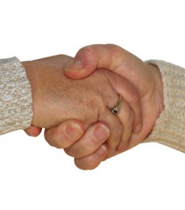 Agreement between friends shown by a handshake