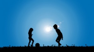 Vector silhouette of a siblings who play on the meadow.