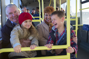 Grandparents with grandchildren on the bus