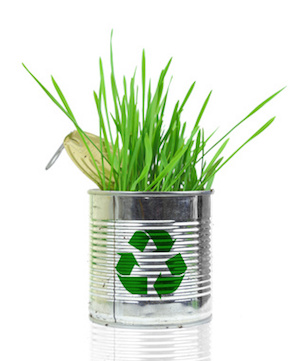 Can with recycle sign and growing grass isolated