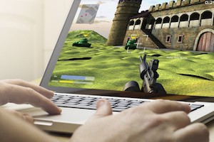 gaming concept: man using a laptop to play war game