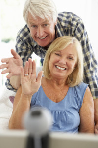 Senior couple using skype