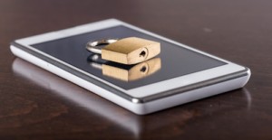 Padlock on a smartphone, security concept