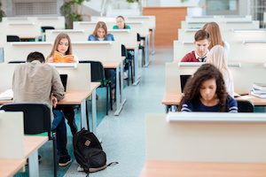 Portrait of a students studying in univeristy library